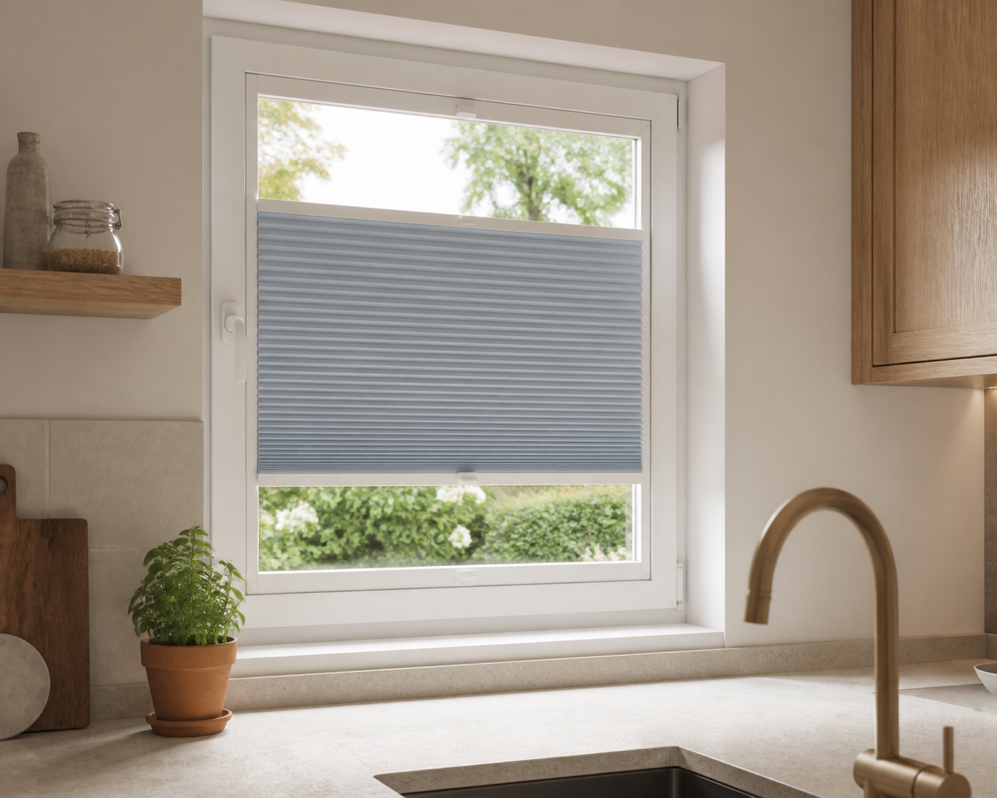 Blue grey pleated blind forming a privacy band in a kitchen window